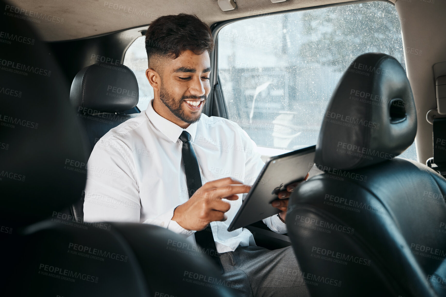 Buy stock photo Business man, tablet and travel in car for online search, trading data and reading stock market information. Indian trader scroll on digital technology, financial website or driving in taxi transport