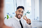 Work selfie, portrait and businessman with a peace sign for social media, working and online update. Happy, funny and young corporate employee with an emoji gesture while taking a photo in an office