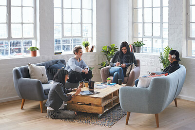 Buy stock photo Meeting, discussion and team in the office lounge or coworking space planning a project in collaboration. Creative, diversity and business people working together with technology on sofa in workplace