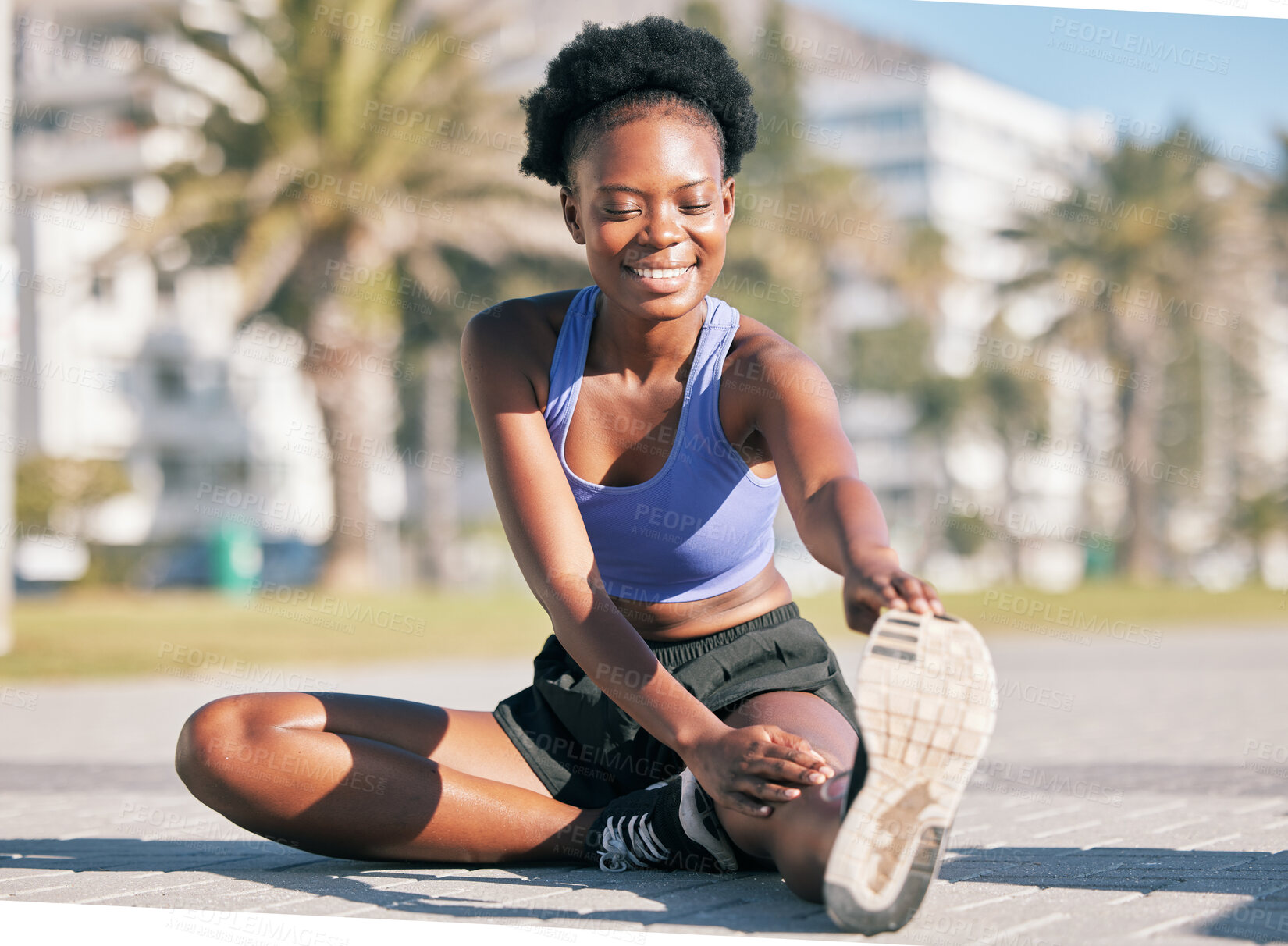 Buy stock photo Exercise, health and stretching with a black woman runner outdoor for the cardio or endurance training of her body. Fitness, sports or running with a young athlete getting ready for a workout