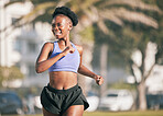 Happy, running and a black woman in the city, thinking and doing cardio in the morning. Smile, idea and an African athlete or runner in town for exercise, a workout or training for a marathon