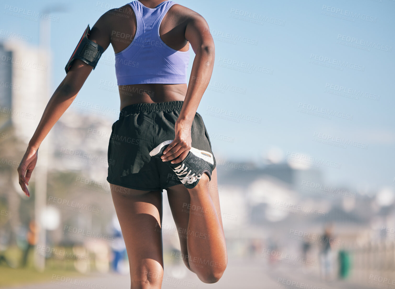 Buy stock photo Stretching legs, fitness and back of a woman in the city for running, exercise and training for a marathon. Morning, outdoor warm up and an athlete ready to start a workout, cardio or sports