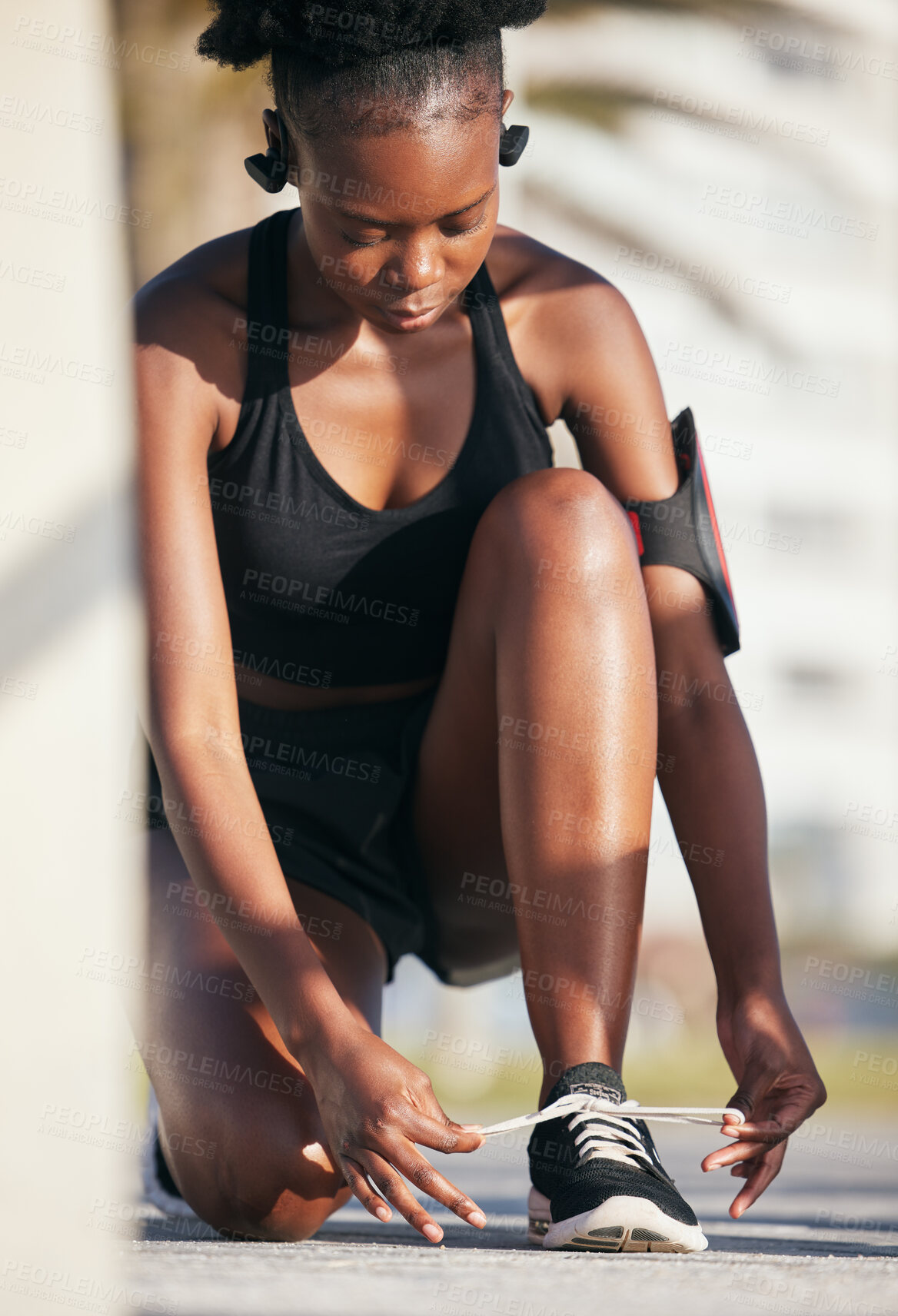 Buy stock photo Black woman, outdoor and tie shoes for workout, training and exercise. Sports, fitness and African athlete tying laces on sneakers to start running, prepare for cardio and jog, health and wellness