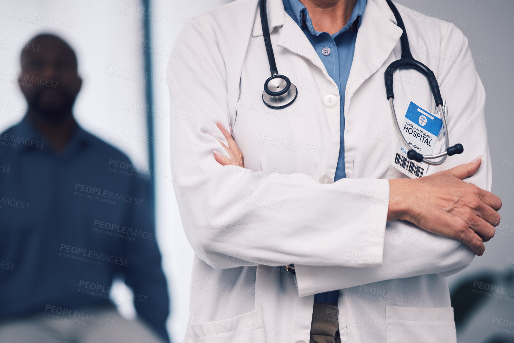 Buy stock photo Doctor, healthcare consultation and arms crossed in clinic or hospital for support, leadership and management. Closeup of medical person and stethoscope for consulting, health insurance and proud job
