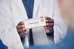 Doctor, hands and box of medication for patient, healthcare or consultation at the pharmacy or clinic. Closeup of male person or medical professional consulting customer with pills or pharmaceuticals