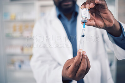 Hands, doctor and vaccine, injection and bottle with medicine, healthcare and safety from virus zoom. Person in pharmacy with drugs, liquid and syringe with glass container, pharmaceutical and health