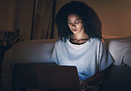 Laptop, sofa and woman typing at night for website, online social media and internet in home. Living room, computer and remote work, freelance and person writing on technology with insomnia in house.