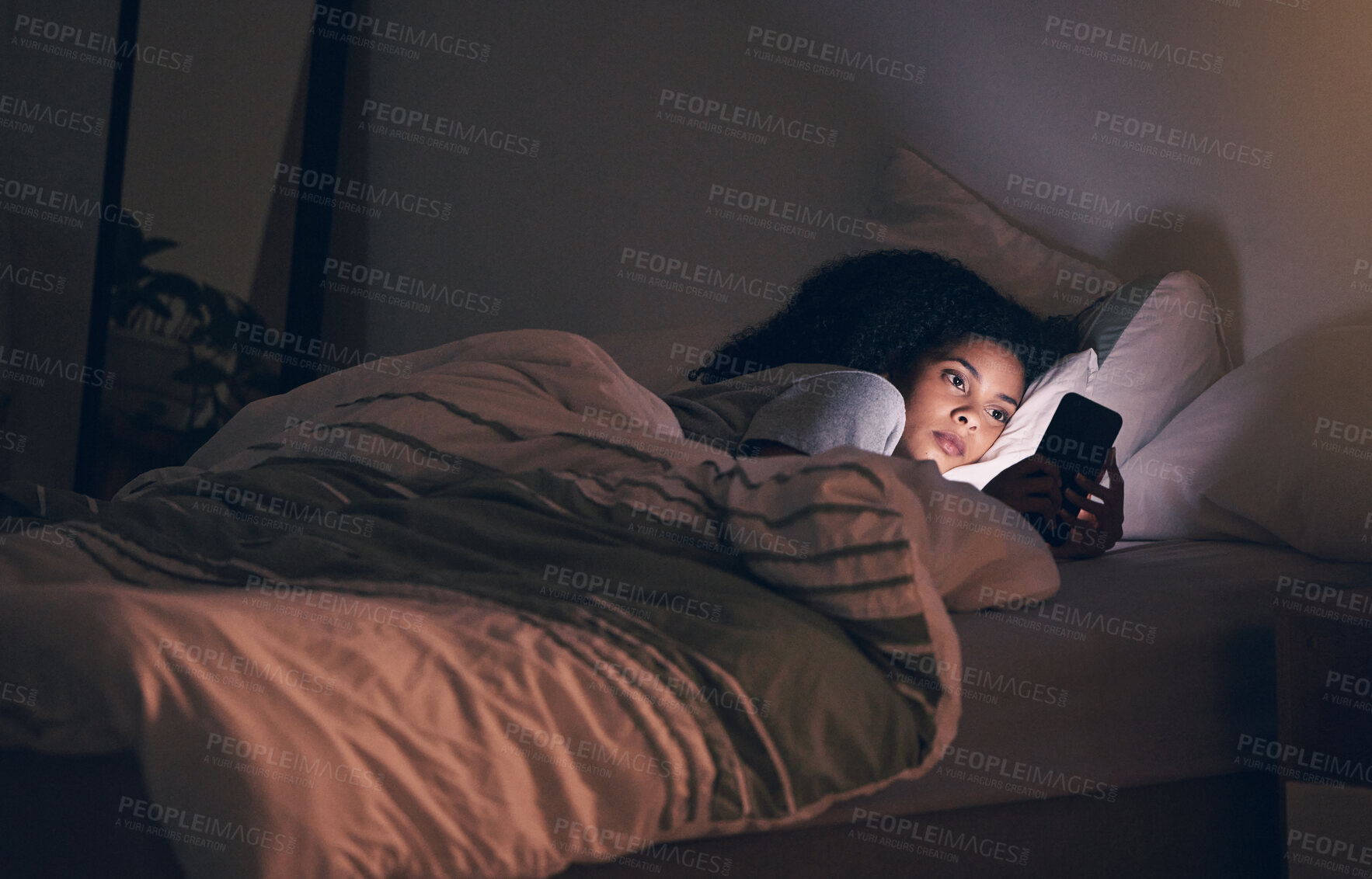 Buy stock photo Tired, night and phone with woman in bedroom for social media app, insomnia and networking. Communication, contact and internet with female person in bed at home for mobile, online and technology