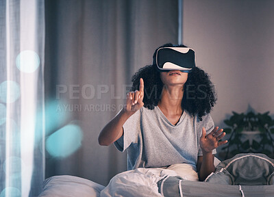 Buy stock photo Woman, bed and vr glasses in night, home and online in metaverse, matrix and press with finger for choice. Girl, augmented reality games and vision for 3d user experience, dark bedroom and apartment