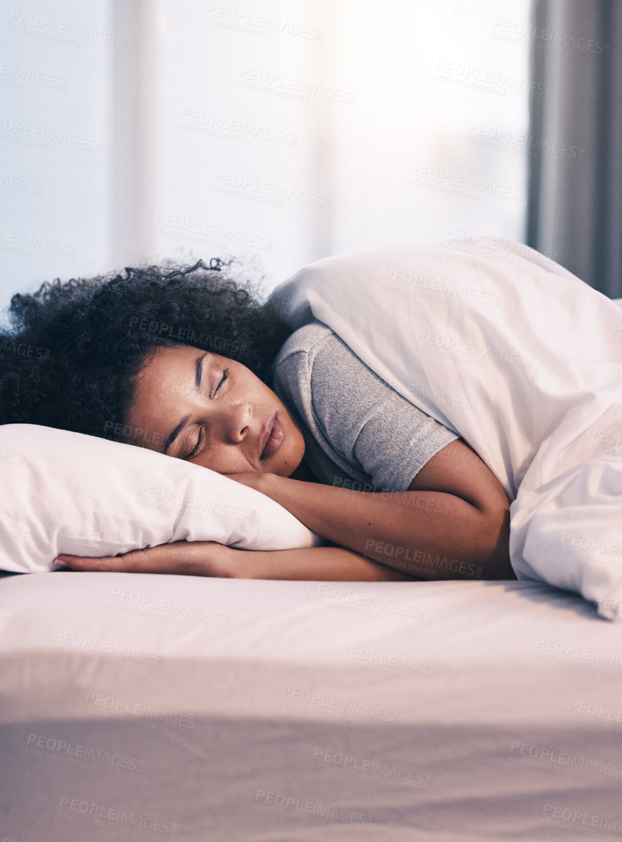 Buy stock photo Sleeping, African woman and bed with morning nap in home with rest feeling calm with peace. House, bedroom and tired female person relax and comfortable on a pillow with blanket dreaming on weekend