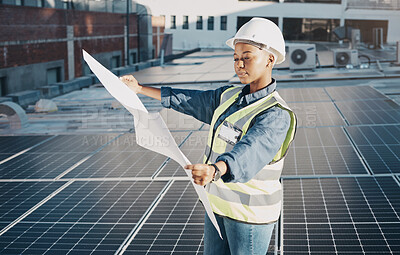 Buy stock photo Female engineer, solar panel blueprint or outdoor on roof for power, sustainability plan and energy development. Black woman, photovoltaic tech and reading on rooftop, building or electricity in city