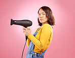 Hairdryer, salon and beauty with portrait of woman in studio for hairdresser, hair care and cosmetics. Shampoo, spa and hairstyle with face of person on pink background for product, shine and glow
