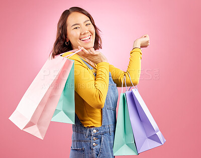Buy stock photo Happy, shopping bag and sale with portrait of woman in studio for discount, fashion and deal. Product, retail and luxury with face of female customer on pink background for market, mall and store