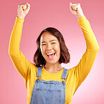 Happy, celebration and success with portrait of woman in studio for party, winner and motivation. Wow, freedom and prize with face of person cheering in pink background for yes, bonus and excited