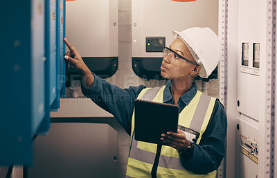 Buy stock photo Engineering, black woman or electrician on tablet for maintenance, server or machine board system. Female technician, digital technology or electrical mechanic in control room at industrial power box