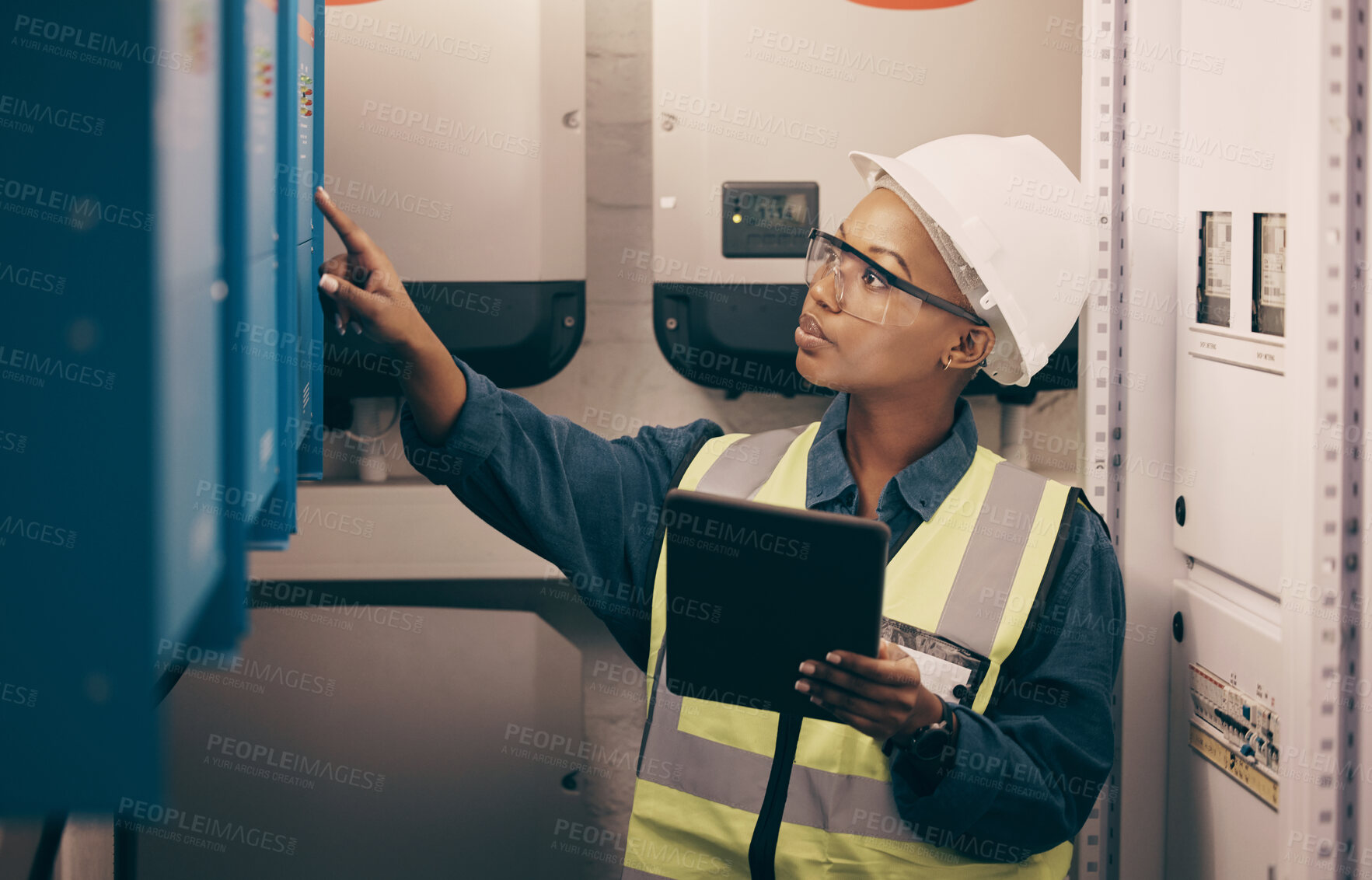 Buy stock photo Engineering, black woman or electrician on tablet for maintenance, server or machine board system. Female technician, digital technology or electrical mechanic in control room at industrial power box