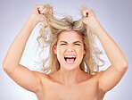 Messy hair, woman shout and frustrated with beauty, problem and salon hairstyle disaster on white background. Haircare stress, female model screaming and angry, treatment fail and damage in studio