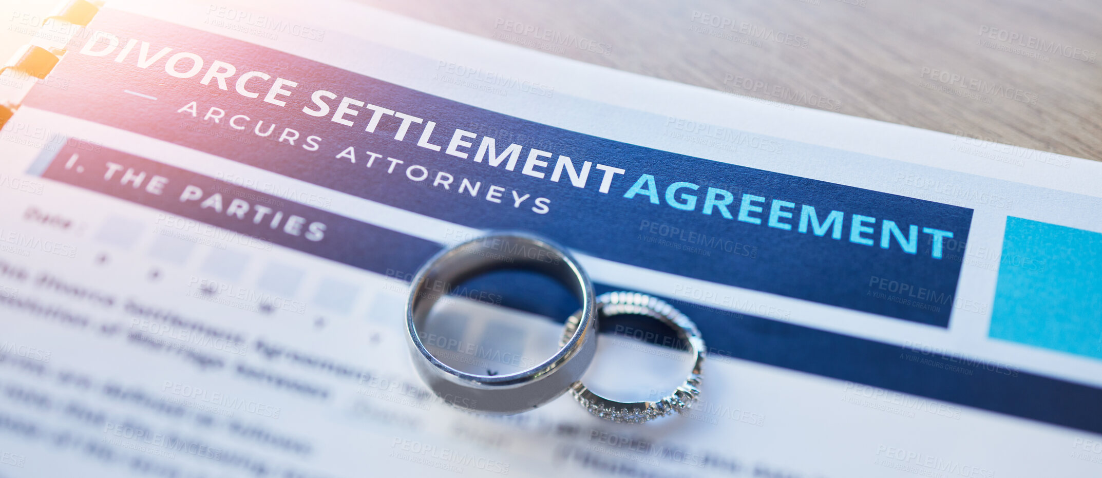 Buy stock photo Ring, lawyer and paperwork for a divorce agreement, legal certificate or document for marriage. Closeup of deal, court and attorney report on end of relationship or contract for family law on a desk