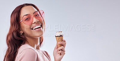 Buy stock photo Fashion, ice cream and portrait of woman with sunglasses in studio with dessert, snack and sweet treats. Happy, smile and face of female person with cone in trendy accessories, style and cosmetics