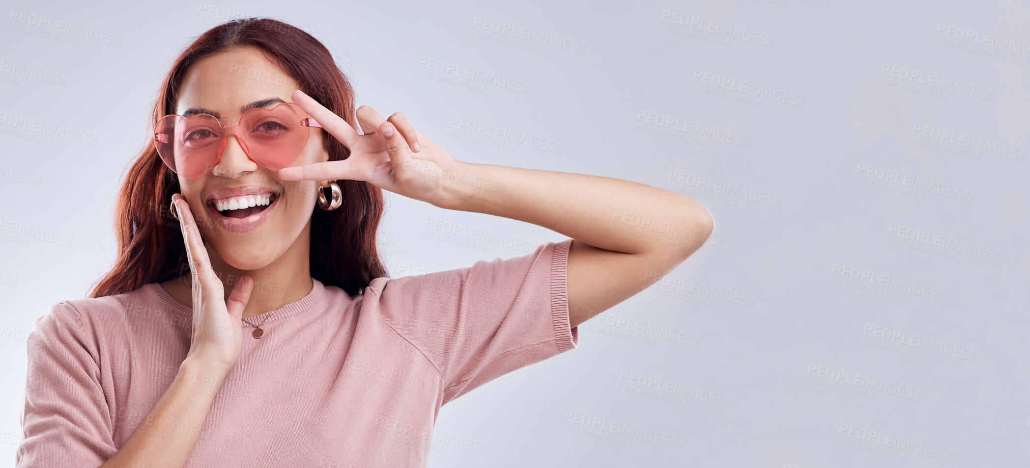 Buy stock photo Fashion sunglasses, portrait or happy woman with banner, smile or retro style isolated on white background. Mockup space, smile or cool gen z girl model with funky style or peace sign in studio 