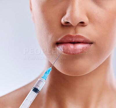 Buy stock photo Lip filler, injection and beauty, woman and cosmetic surgery with face closeup isolated on white background. Skincare, liquid collagen and female model, skin and syringe with dermatology in studio