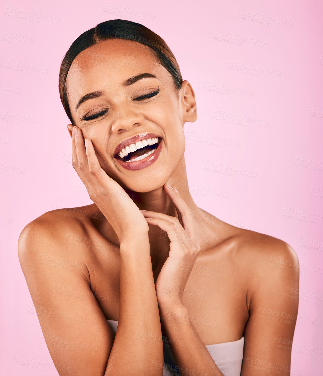 Buy stock photo Funny, smile and woman with skincare, beauty and dermatology against a pink studio background. Female person, humor or happy model with makeup, wellness and facial with luxury, laughing and aesthetic