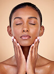 Relax, skincare or natural woman with wellness, beauty or facial glow with dermatology cosmetics in studio. Hands, background or face of Indian girl model resting with shine, eyes closed or self love