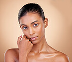 Skincare, beauty and portrait with indian girl with glow in brown studio background. Natural, face and dermatology with cosmetics for luxury facial with spa treatment with self care in mock up.