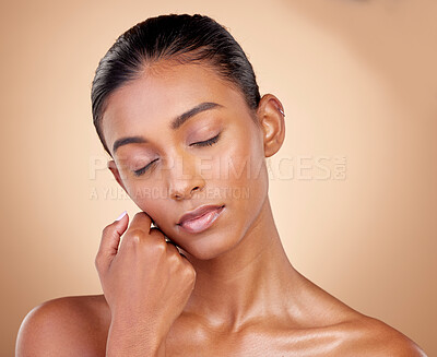 Buy stock photo Relax, beauty or Indian woman with natural skincare or facial glow with dermatology cosmetics in studio. Eyes closed, mockup or face of gen z girl model resting or sleeping with wellness or self love