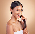 Strong hair, portrait or happy girl with beauty, skincare or self care for glow, shine or collagen in shampoo. Healthy texture, model or Indian woman smiling with cosmetics for treatment or grooming