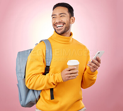 Buy stock photo Backpack, phone and happy man or student thinking of university, college and e learning results on pink background. Scholarship, education and asian person with bag, coffee and mobile chat in studio