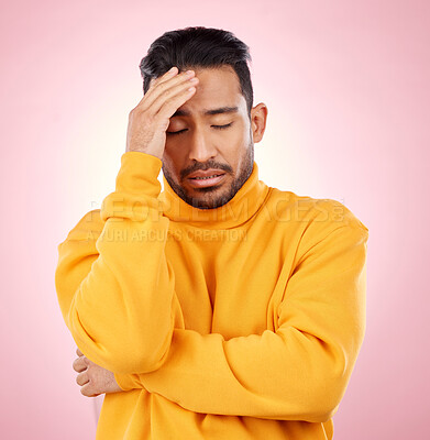Buy stock photo Stress, headache and asian man in studio with depression, broken heart or brain fog on pink background. Anxiety, migraine and Japanese guy in crisis, mistake or fail, vertigo or frustrated by trauma