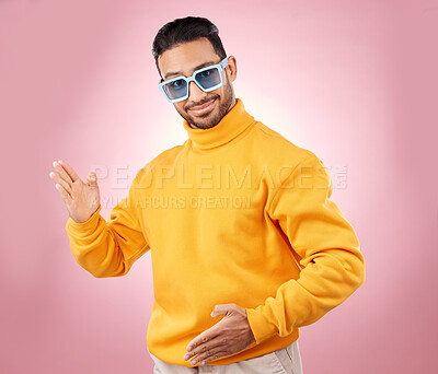 Buy stock photo Man, robot dance and sunglasses in studio portrait with smile, moving or fashion for aesthetic by pink background. Asian gen z student, happy and clothes in futuristic glasses, comic dancing or party