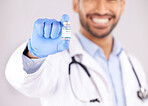 Vaccine, doctor hands and monkeypox bottle for safety, medicine development and healthcare innovation in studio. Closeup of medical worker with vaccination, liquid vial and drugs for virus immunity