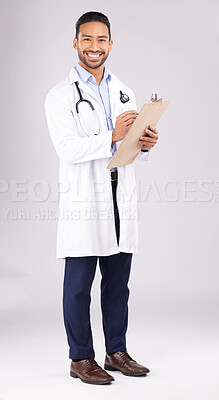 Buy stock photo Happy asian man, portrait or doctor with clipboard in studio, planning notes or medical information. Healthcare worker smile for report of insurance checklist, documents or script on white background