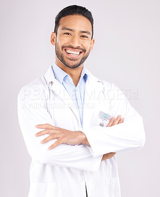 Buy stock photo Man, portrait and scientist smile with arms crossed in studio isolated on a white background. Confidence, face and Asian doctor of science, research expert or happy medical professional from Cambodia