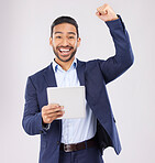Happy businessman, portrait and tablet with fist pump in celebration for promotion win against a grey studio background. Excited asian man on technology for good news, lottery prize or sale discount