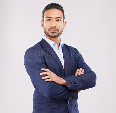 Buy stock photo Business man, arms crossed and studio portrait with serious face, ambition or mindset by white background. Asian entrepreneur, financial advisor and suit for corporate fashion with professional style