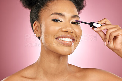 Buy stock photo Makeup, mascara and beauty portrait of a woman for skincare, wellness and dermatology glow. Happy, eyelash and face cosmetics of a black female model with facial shine on a pink background in studio