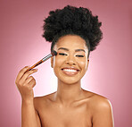Makeup, portrait and black woman with brushes, facial and grooming against a studio background. Female person, aesthetic and happy model with cosmetic tools, shine and natural beauty with skincare