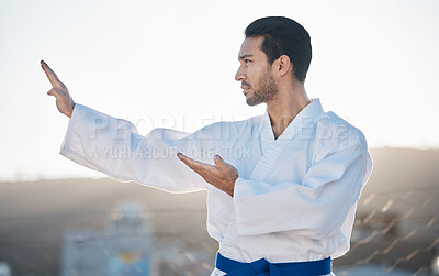 Buy stock photo Karate, fitness and profile of a sports man in the city for self defense training or a combat workout. Exercise, mindset and fighting with a serious young male athlete or warrior in an urban town