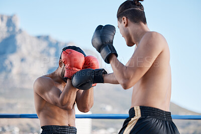 Buy stock photo Punch, boxing match or men in sports training, exercise or fist punching with strong power in workout. Fitness, boxers or combat athletes fighting in a mma practice match in ring on rooftop in city