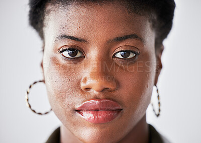 Buy stock photo Serious, beauty and face of black woman with confidence on a white background in studio closeup. Student, portrait and African person or calm, female model with cosmetics and style in South Africa