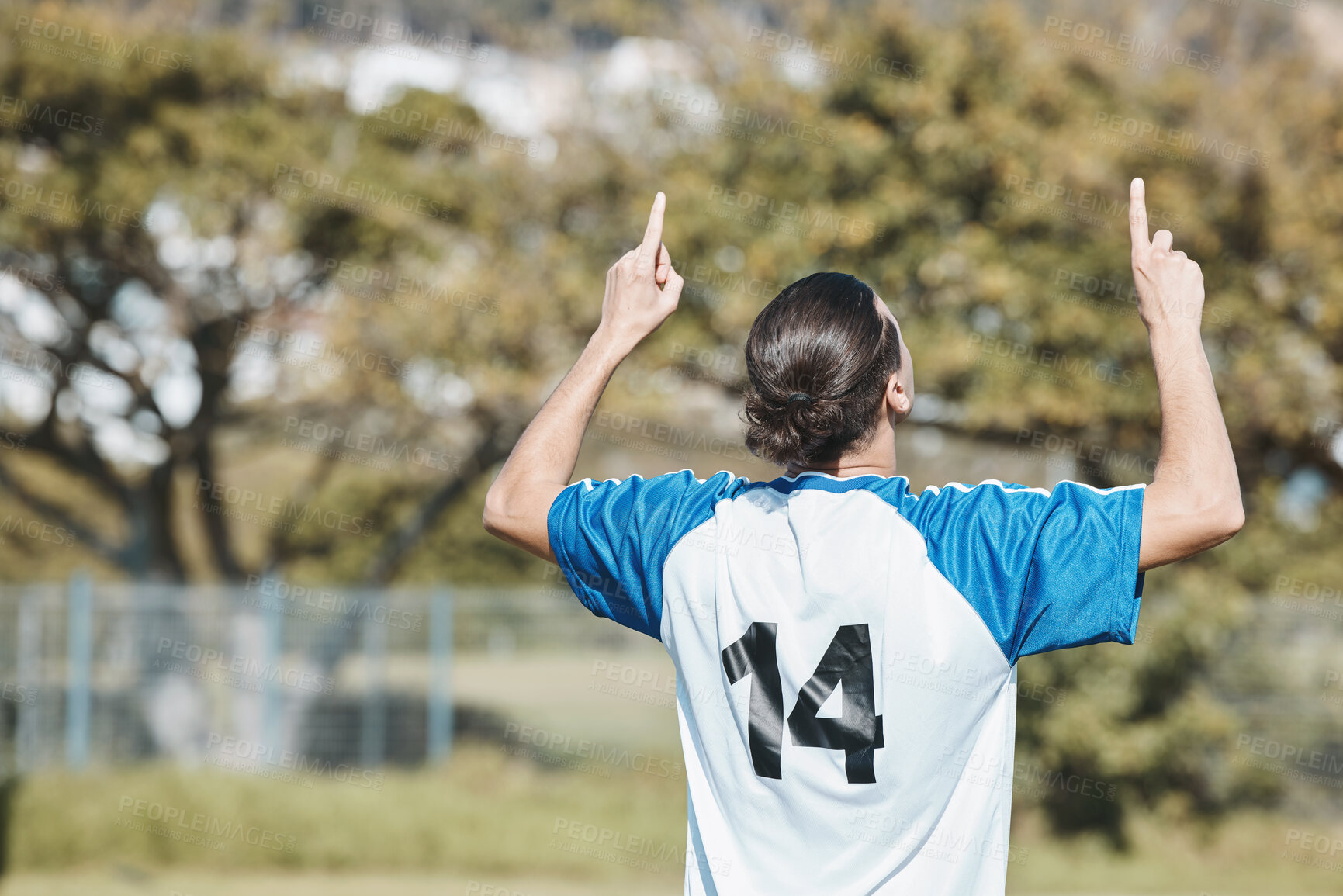 Buy stock photo Back, success and a man with a gesture for soccer, game win and celebration of a goal. Happy, field and a football player or athlete excited about a sports achievement, competition or motivation