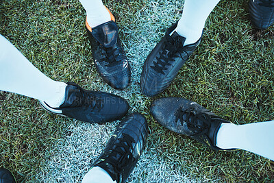 Buy stock photo Soccer, sport shoes and teamwork with people together on a grass field for motivation or competition. Closeup, above and football player or athlete group on a pitch for training, exercise or fitness 