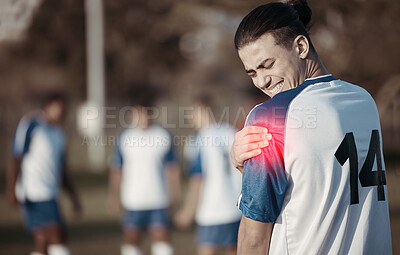 Buy stock photo Soccer player, shoulder pain or man with injury on field in sports training accident or workout game. Emergency, red glow or injured football athlete suffering from arm muscle in fitness exercise