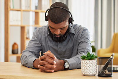 Buy stock photo Call center, stress and black man praying in office for workload, relief or mistake at desk. Telemarketing, fail and guy consultant pray for help with depression, anxiety or customer service pressure