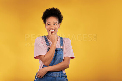 Buy stock photo Nervous, black woman and biting nails in studio with oops reaction to gossip on yellow background. Mistake, sorry and female overwhelmed by fake news, drama or secret with regret, shame or awkward
