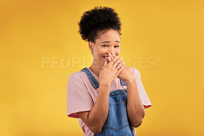 Buy stock photo Laughing, funny and portrait of woman with wow reaction to news isolated in a yellow studio background. Comedy, comic and happy young female person covering mouth due to crazy gossip energy or meme