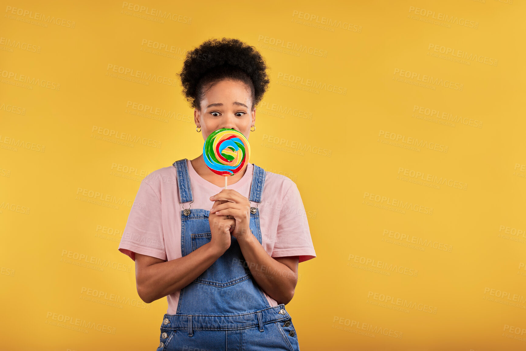 Buy stock photo Black woman, portrait with candy or lollipop in studio on yellow background and eating sweets, dessert or food with sugar. Gen z, girl and guilty pleasure in delicious treats, snack or product